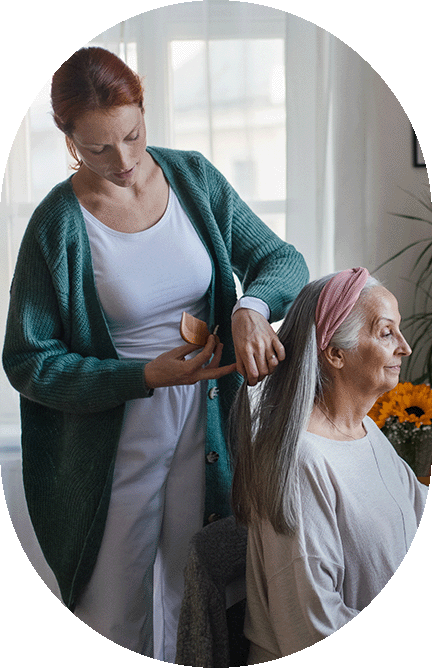 woman having her hair brushed