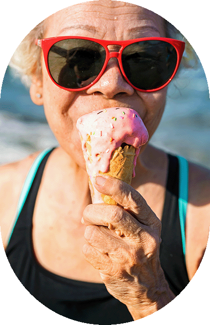 senior woman in red sunglasses eating an ice cream code