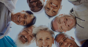 Group of smiling seniors from above.